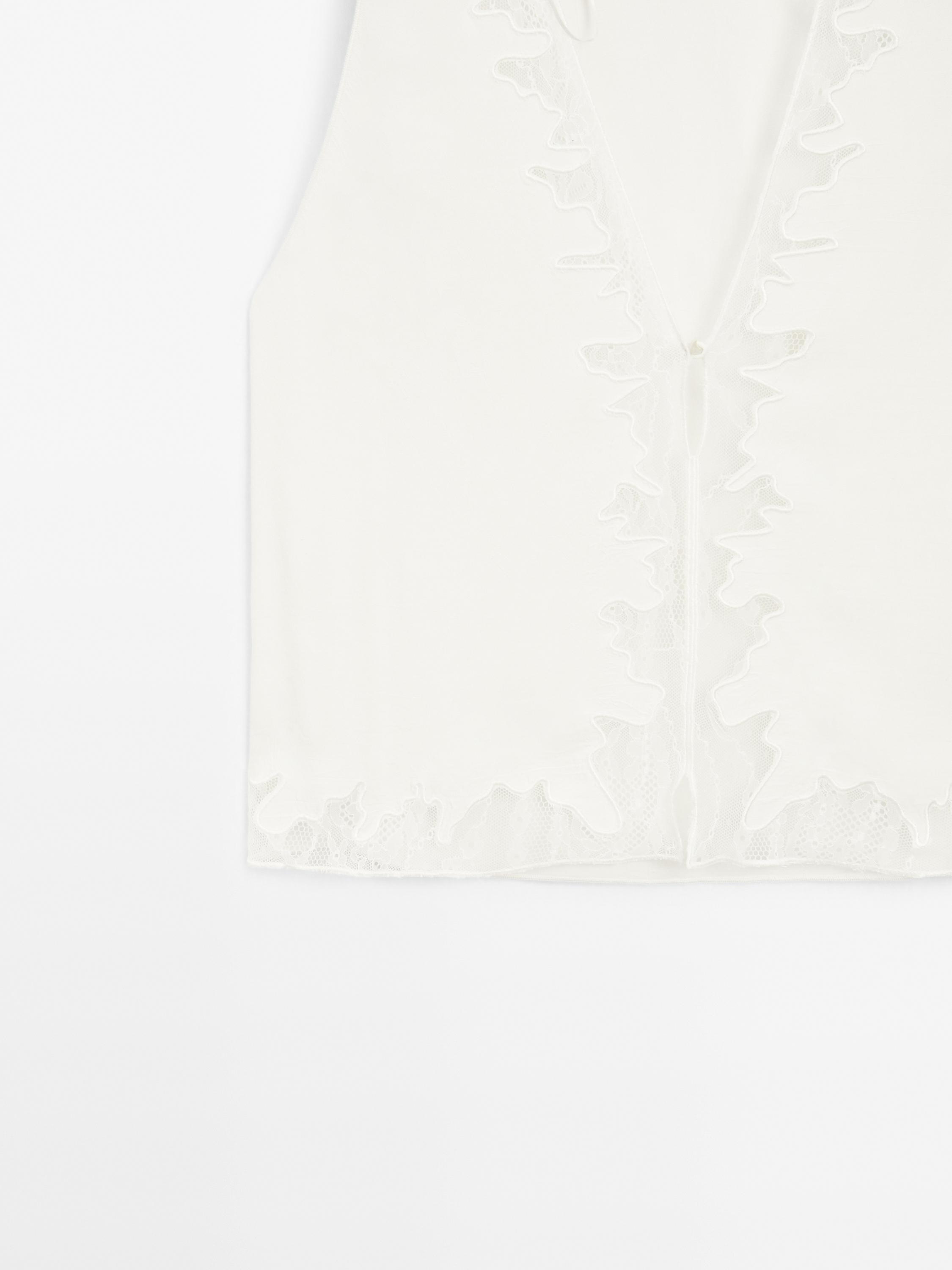 Blouse fluide à dentelle